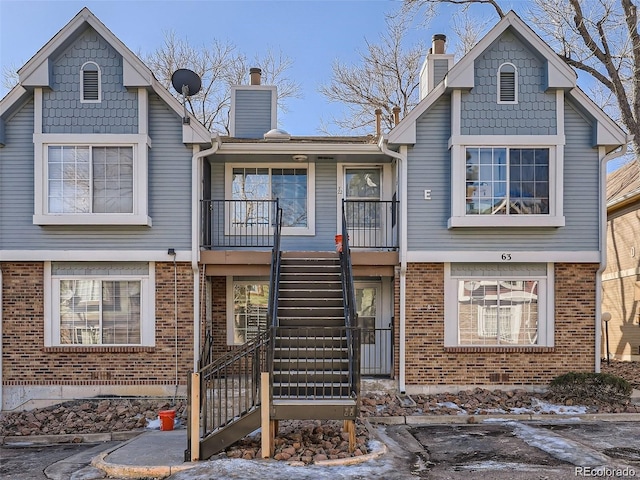 view of front of property with a balcony