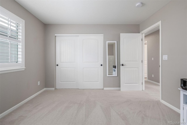 14258 Greenfield Loop, Parker, CO 80134 - unfurnished bedroom featuring a closet, carpet, and baseboards