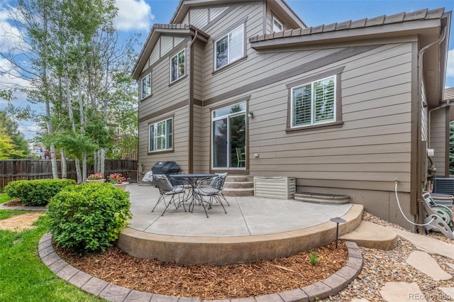 14258 Greenfield Loop, Parker, CO 80134 - back of house with a patio