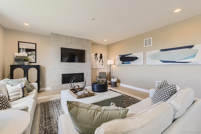 living room with a large fireplace