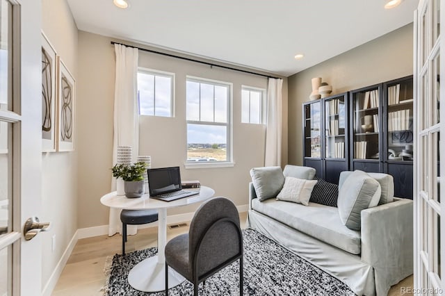 home office with light wood-type flooring