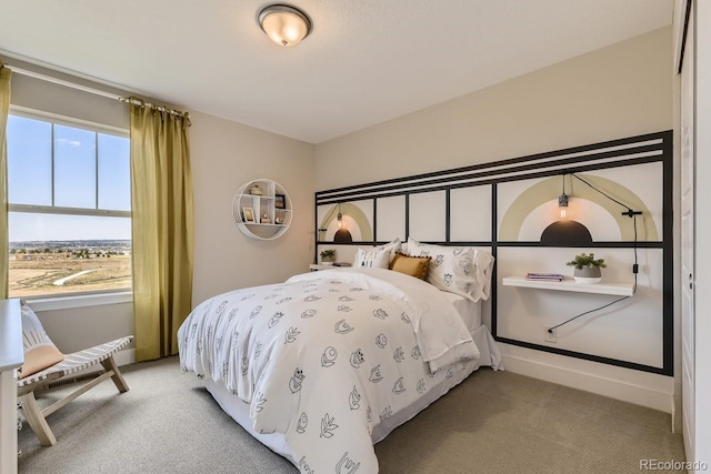 bedroom featuring light carpet