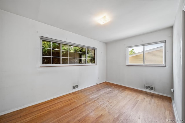 2571 S Birch St, Denver, CO 80222 - spare room with wood finished floors and baseboards