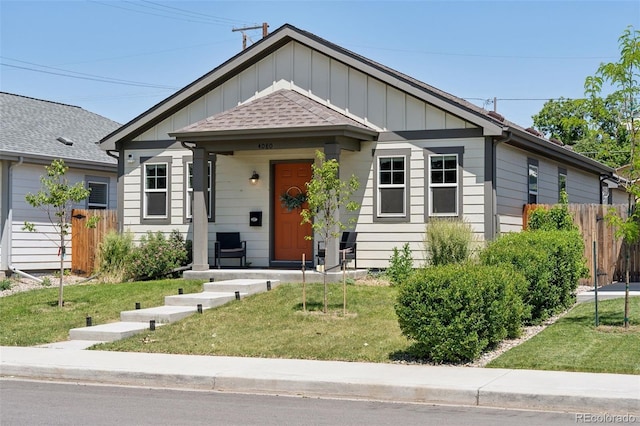 4080 Adams St, Denver, CO 80216 - view of front of home featuring board and batten siding