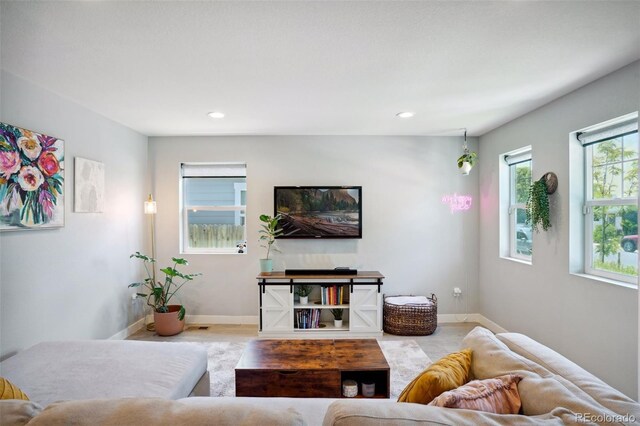 4080 Adams St, Denver, CO 80216 - living area with baseboards and recessed lighting