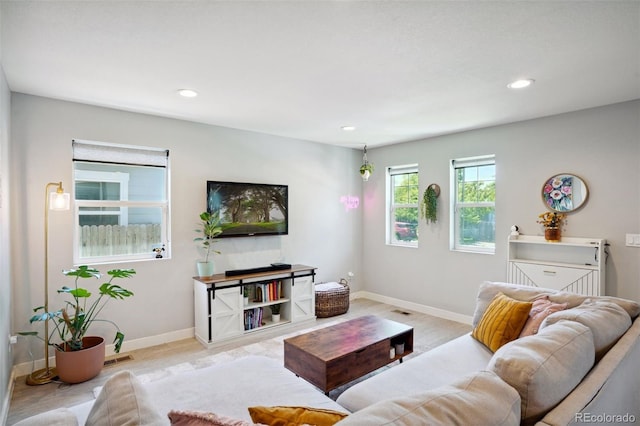 4080 Adams St, Denver, CO 80216 - living area featuring recessed lighting and baseboards