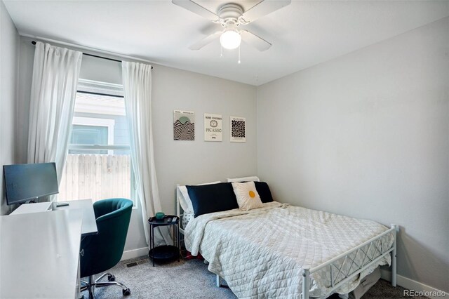 4080 Adams St, Denver, CO 80216 - bedroom with carpet floors, baseboards, ceiling fan, and an office area
