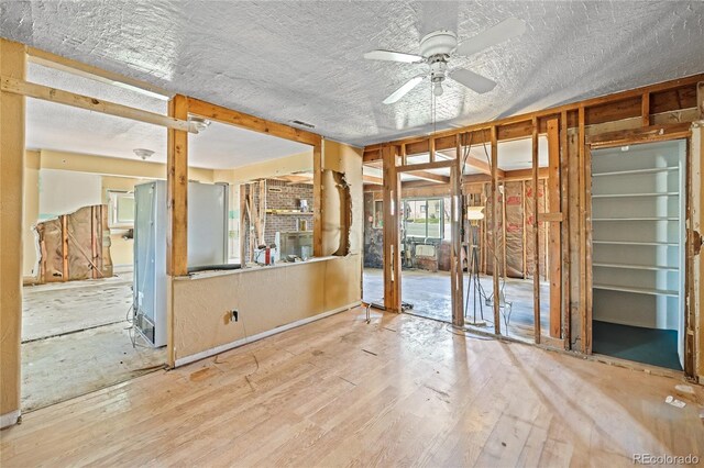 660 K Ave, Limon, CO 80828 - spare room with wood-type flooring, a ceiling fan, a textured ceiling, and visible vents