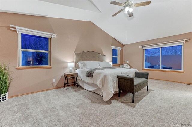 bedroom featuring carpet floors, baseboards, ceiling fan, and vaulted ceiling