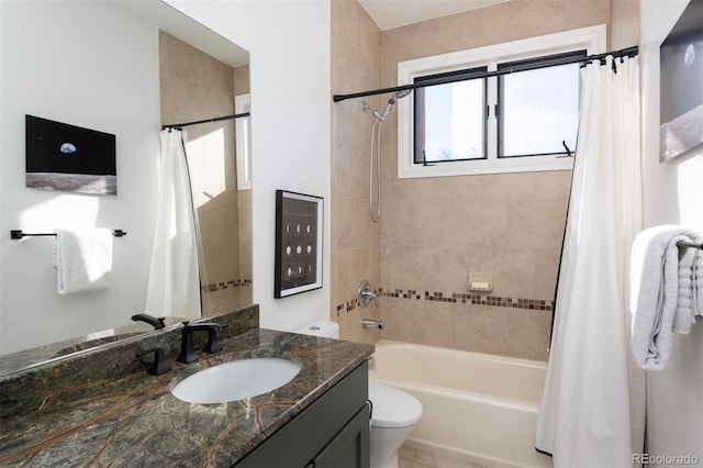 full bathroom with vanity, toilet, and shower / bath combo with shower curtain