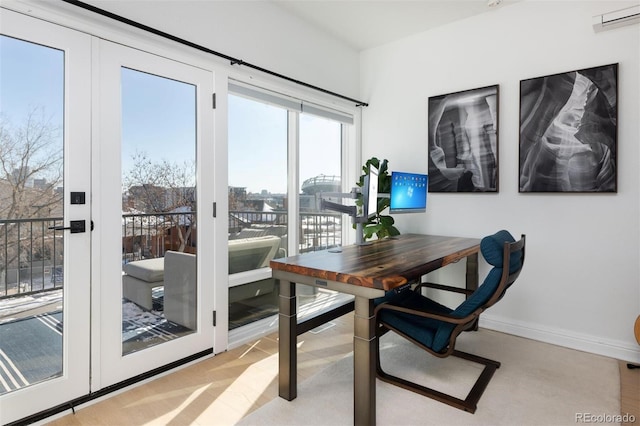 dining room featuring a wall unit AC