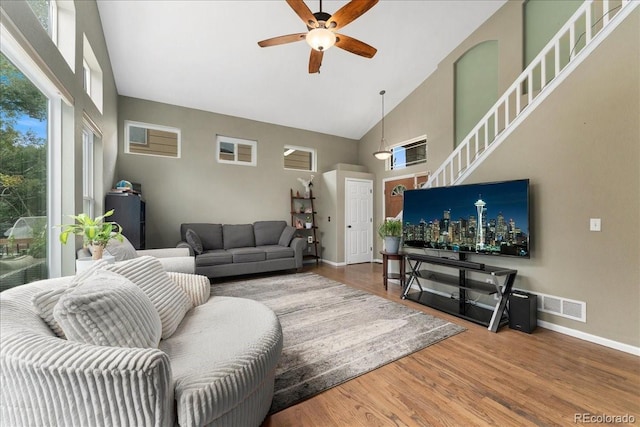 5370 S Gray St, Littleton, CO 80123 - living area with high vaulted ceiling, a ceiling fan, and wood finished floors