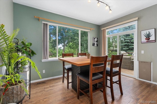 5370 S Gray St, Littleton, CO 80123 - dining area featuring wood finished floors and track lighting