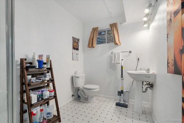 5370 S Gray St, Littleton, CO 80123 - bathroom with tile patterned floors and toilet