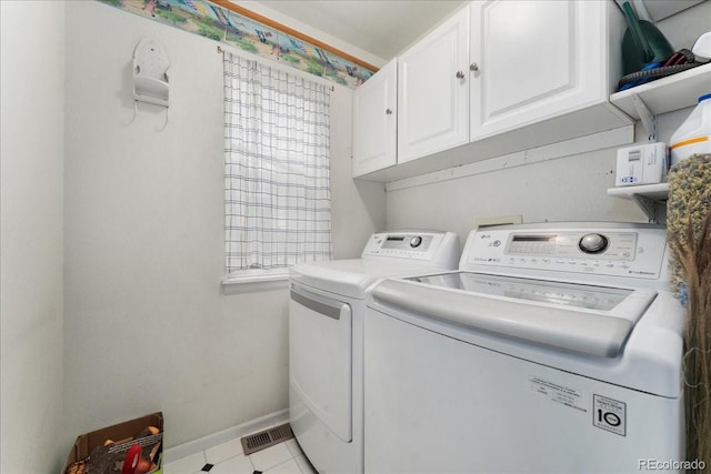 5370 S Gray St, Littleton, CO 80123 - laundry area featuring cabinet space and washing machine and clothes dryer