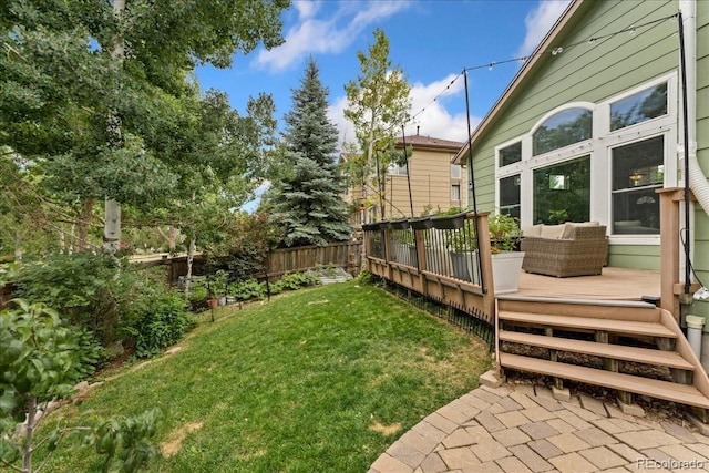 5370 S Gray St, Littleton, CO 80123 - fenced backyard featuring a deck