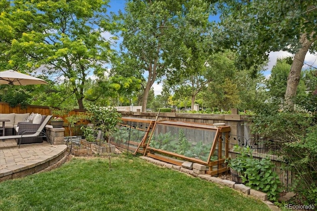 5370 S Gray St, Littleton, CO 80123 - fenced backyard featuring a patio and an outdoor living space