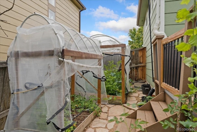 5370 S Gray St, Littleton, CO 80123 - view of patio / terrace featuring a vegetable garden