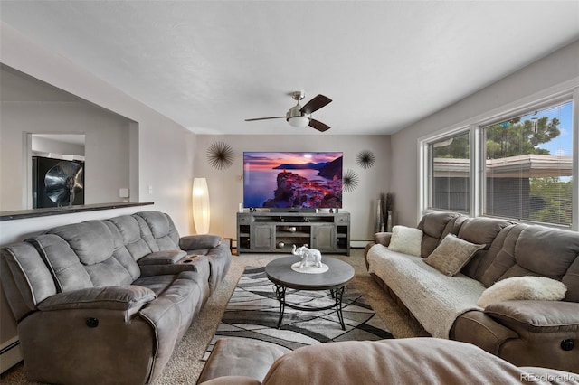 2633 Summit Dr, Colorado Springs, CO 80909 - living room with carpet flooring, a ceiling fan, baseboard heating, and a baseboard heating unit