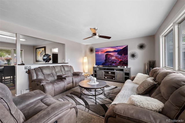 2633 Summit Dr, Colorado Springs, CO 80909 - carpeted living area featuring ceiling fan