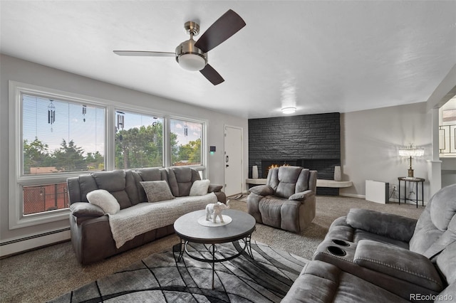 2633 Summit Dr, Colorado Springs, CO 80909 - carpeted living room featuring a ceiling fan and baseboard heating