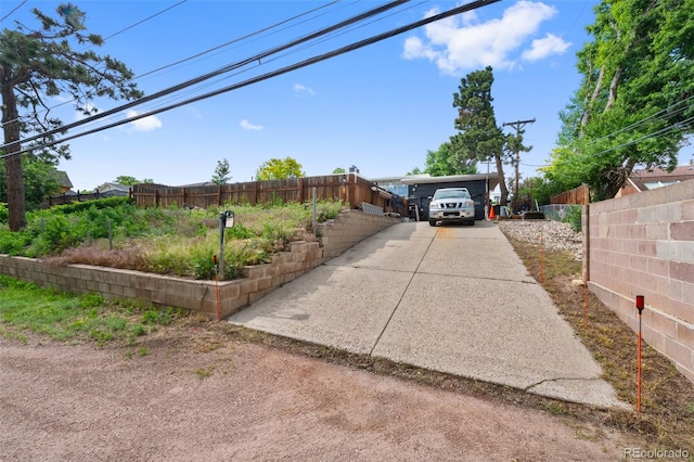 2633 Summit Dr, Colorado Springs, CO 80909 - view of front of house with concrete driveway