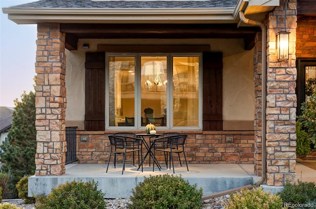 patio terrace at dusk with a porch