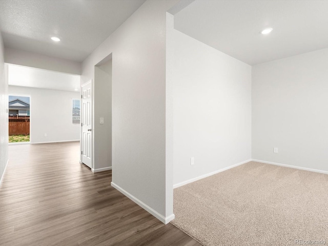 4635 Goldflower Dr, Johnstown, CO 80534 - hall featuring recessed lighting and dark wood-type flooring