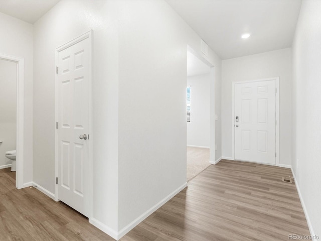 4635 Goldflower Dr, Johnstown, CO 80534 - corridor featuring light wood-style floors and recessed lighting