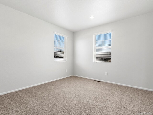 4635 Goldflower Dr, Johnstown, CO 80534 - carpeted spare room featuring baseboards