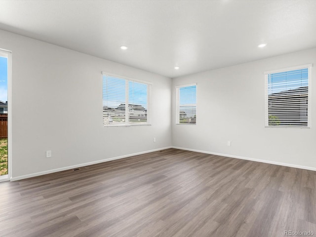 4635 Goldflower Dr, Johnstown, CO 80534 - spare room with wood finished floors and recessed lighting