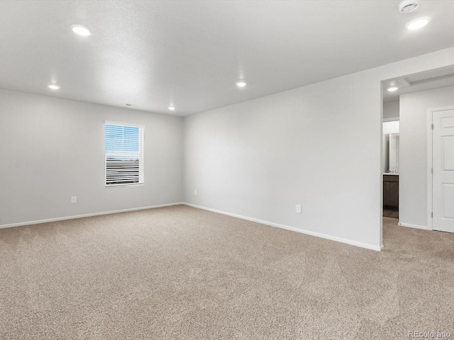 4635 Goldflower Dr, Johnstown, CO 80534 - unfurnished room featuring light carpet, recessed lighting, and a smoke detector