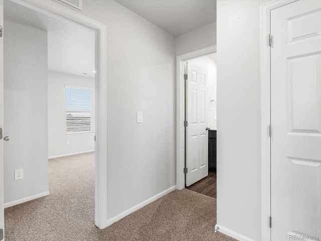 4635 Goldflower Dr, Johnstown, CO 80534 - hall featuring carpet floors and baseboards