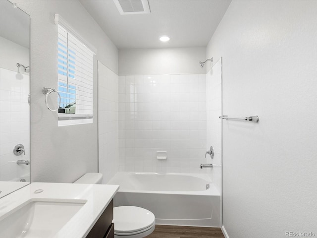 4635 Goldflower Dr, Johnstown, CO 80534 - bathroom with vanity, wood finished floors, and shower / bath combination