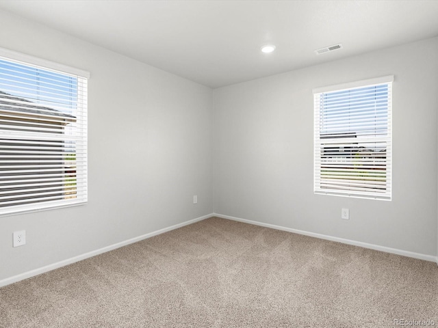 4635 Goldflower Dr, Johnstown, CO 80534 - empty room featuring carpet flooring, plenty of natural light, and recessed lighting