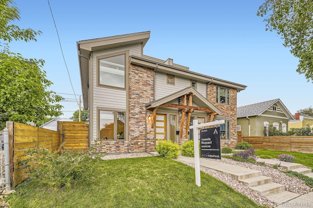 2442 S Bannock St, Denver, CO 80223 - view of front facade with brick siding