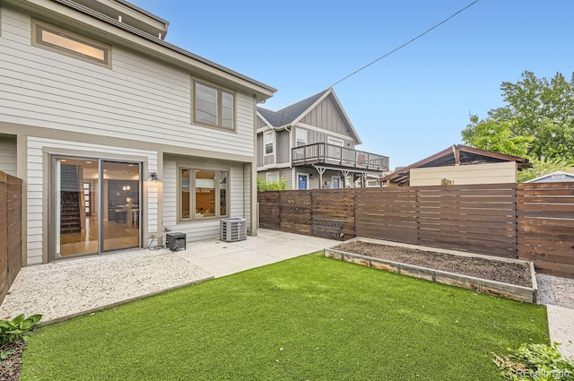 2442 S Bannock St, Denver, CO 80223 - view of yard with a patio, central AC, and a garden