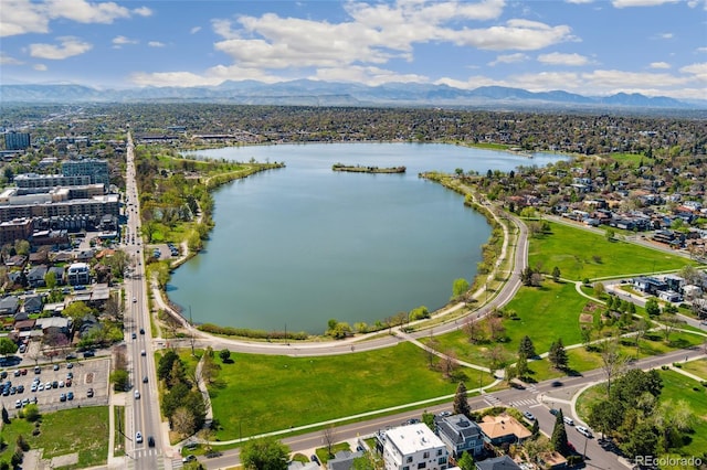 aerial view of property's location with a water and mountain view