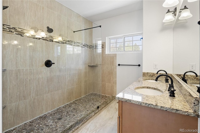 420 Sunshine Pkwy, Golden, CO 80403 - bathroom featuring tiled shower and double vanity