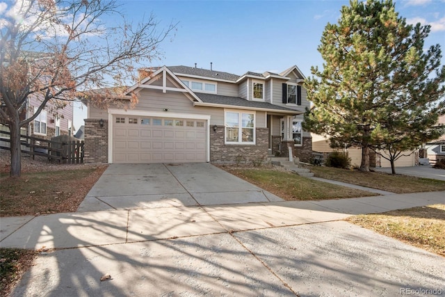 view of front of property featuring driveway, an attached garage, fence, and brick siding