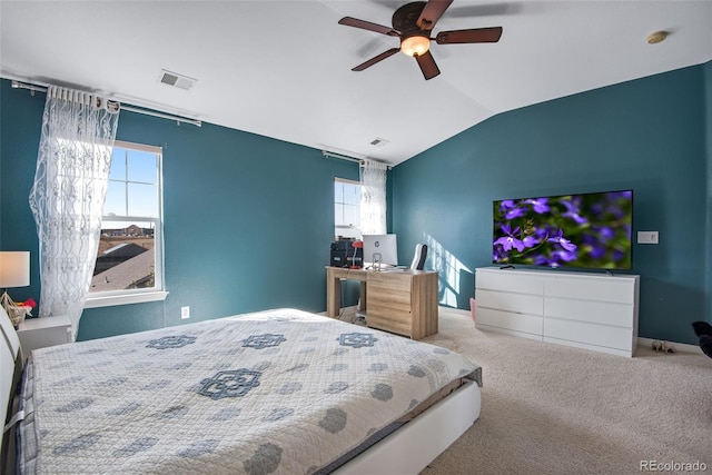 bedroom featuring visible vents, vaulted ceiling, carpet flooring, and ceiling fan