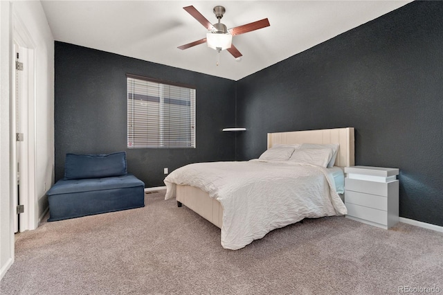25127 E Maple Ave, Aurora, CO 80018 - bedroom featuring carpet, baseboards, a ceiling fan, and a textured wall