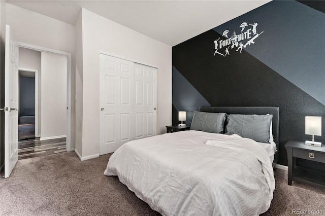25127 E Maple Ave, Aurora, CO 80018 - carpeted bedroom featuring a closet and baseboards