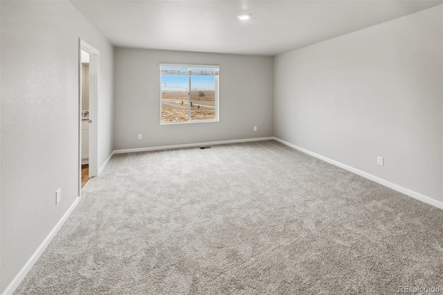 spare room with carpet flooring