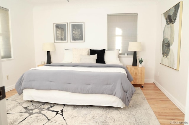 bedroom with wood-type flooring