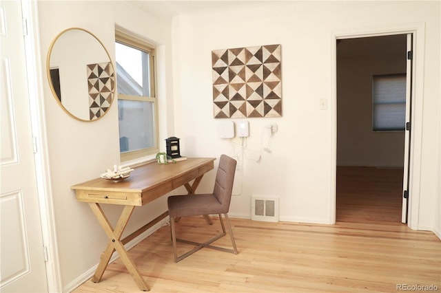 office space featuring light hardwood / wood-style flooring