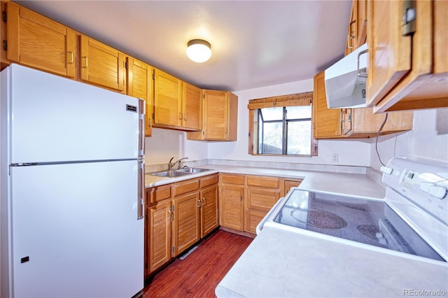 1703 W Weaver Ave, Littleton, CO 80120 - kitchen featuring white appliances, a sink, light countertops, and dark wood-type flooring