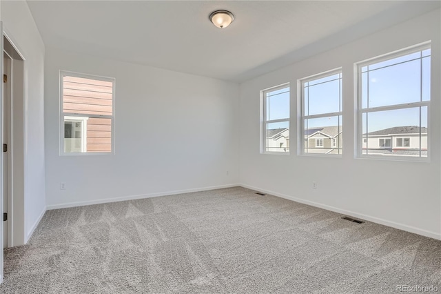 view of carpeted spare room