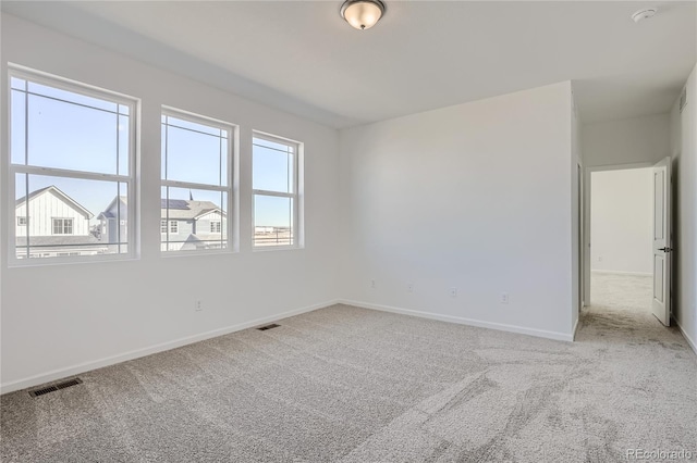 empty room with carpet floors