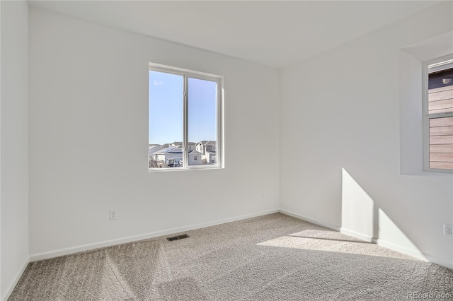 view of carpeted spare room